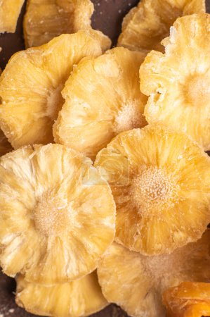 Photo for Close-up view from above of dried pineapple slices - Royalty Free Image