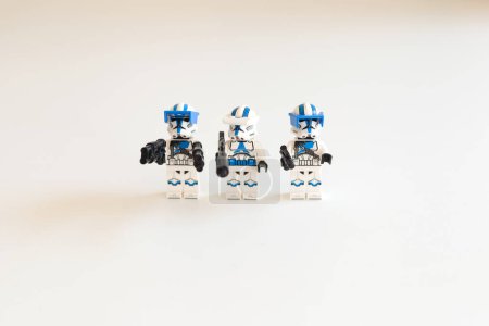 Photo for Tallinn, ESTONIA-AUGUST 7 2023- Lego star wars troopers on white background. close up of three mini figures - Royalty Free Image