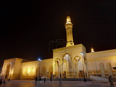 Photo for A beautiful night view of the Sayed Al-Shuhada Mosque in Madinah, Saudi Arabia.  The mosque is located in Uhud near the historic Mount of Uhud. - Royalty Free Image