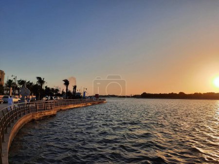 Photo for Beautiful evening and colorful sunset at Jeddah, Corniche, Saudi Arabia, The Jeddah Corniche, also known as the Jeddah Waterfront, is a coastal area of the city of Jeddah, Saudi Arabia. Located along the Red Sea. - Royalty Free Image