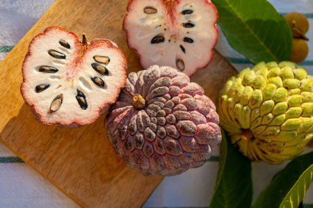 Photo for Cherimoya or custard apple tasty ripe tropical exotic fruits close up - Royalty Free Image