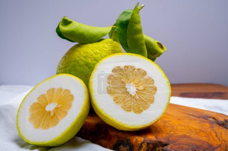 Photo for Lemon citron cedrate or Citrus medica, large fragrant citrus fruit with thick rind used for making italian limonchello liquor - Royalty Free Image