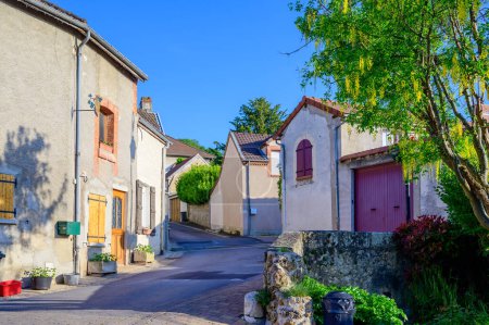 Photo for Walking in touristic old village with abbey Hautvillers, cradle of sparkling wine champagne, France. - Royalty Free Image