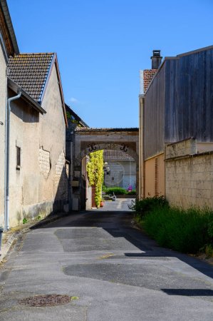 Photo for Walking in touristic old village Ambonnay, grand cru village for producing of sparkling champagne, France - Royalty Free Image