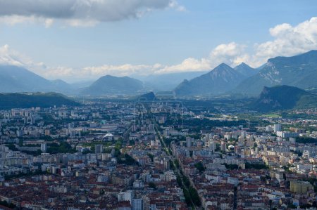Photo for View on central part of Grenoble city from Bastille fortres witn mountains around, old cable car, Isere, France in summer - Royalty Free Image