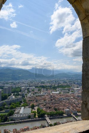 Photo for Descent from the Bastille fortress by stairs,  staircase of giants in central part of Grenoble city witn mountains around, old cable car, Isere, France in summer - Royalty Free Image