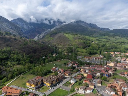Photo for Aerial view on Los Arenas, mountain village where famous cabrales cheese is produced, Picos de Europa mountains, Asturias, North of Spain. - Royalty Free Image