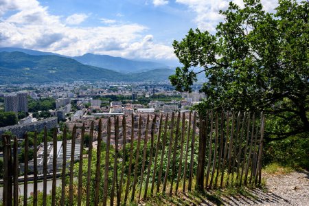 Photo for Descent from the Bastille fortress by stairs,  staircase of giants in central part of Grenoble city witn mountains around, old cable car, Isere, France in summer - Royalty Free Image