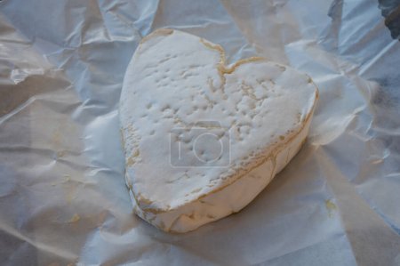 Cheese collection, French cheese from Normandy region, heart-shaped neufchatel from farm shop close up