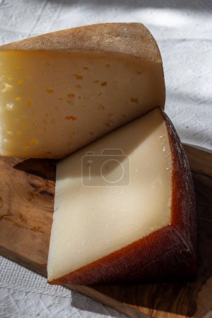 Spanish hard manchego, cow, sheep and goat cheese  close up