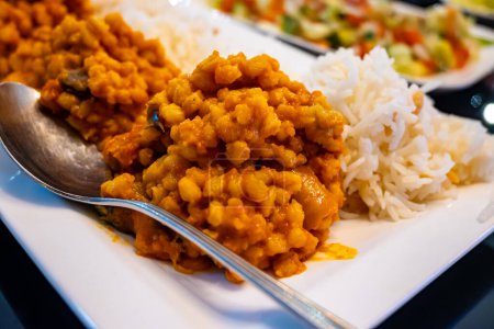 Photo for Side dishes, vegetarian mezze in Turkish restaurant, bulgur pilaf en rice - Royalty Free Image
