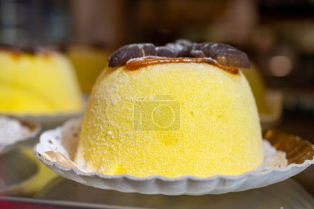 Polenta e Osei di Bergamo Alta, most renowned sweet specialty of Bergamo cuisine, made from sponge cake, chocolate, butter, hazelnut creams and rum