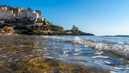 View on sandy beach and sea water in medieval small touristic coastal town Sperlonga and sea shore, Latina, Italy in winter