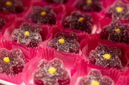 French or italian sweets, fruit jelly bonbons on display in confectionery shop in Milan, Italy close up, fruit juice marmalade