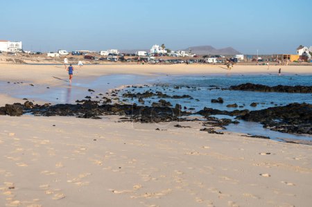 Photo for West coast of Fuerteventura island. Winter sea and sun vacation in El Cotillo touristic village, Canary islands, Spain on white sandy beach La Concha. - Royalty Free Image