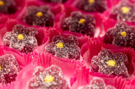 French or italian sweets, fruit jelly bonbons on display in confectionery shop in Milan, Italy close up, fruit juice marmalade