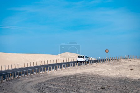 Driving car to north of Fuerteventura, sandy dunes, Corralejo, Canary islands, Spain in winter