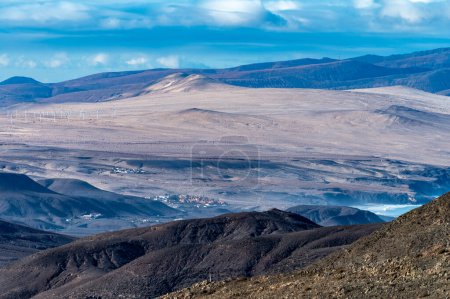 Photo for Panoramic view on colourful remote sandy isthmus of Jandia peninsula and basal hills and mountains of Massif of Betancuria, Fuerteventura, Canary islands, Spain - Royalty Free Image