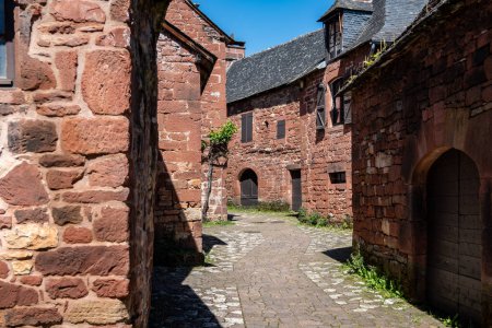 Collonges-la-Rouge village one of the most beautiful villages in France with houses made from red stones, tourists destination in Dordogne