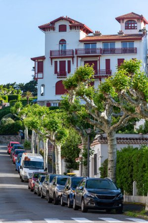 White houses and villas of Saint Jean de Luz town on Basque coast, famous resort, known for beautiful architecture, nature and cuisine, South of France, Basque Country