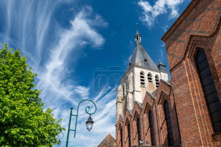 Views of old part of town of Gien on the Loire river, in Loiret department, France, church tower