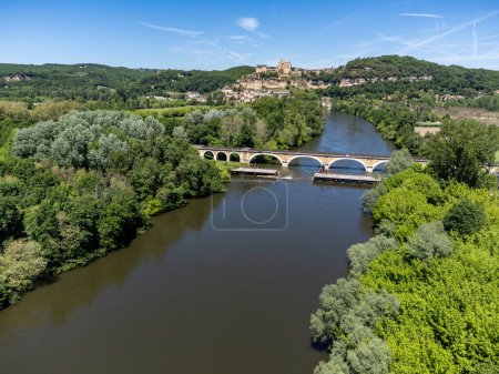 Aerial view on Dordogne river near Beynac-et-Cazenac rocky village located in Dordogne department in southwestern France