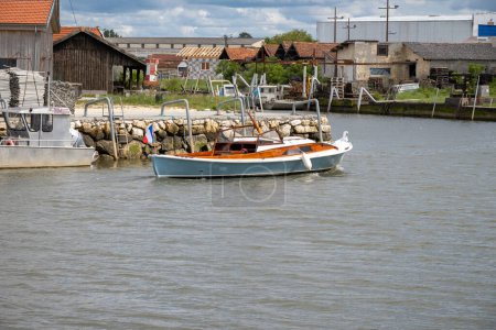 Travelling in France, old wooden huts and oysters farms in Gujan-Mestras village, cultivation, fishing and sale of fresh oysters seashells, Arcachon bay, Atlantic ocean, France, tourists destination