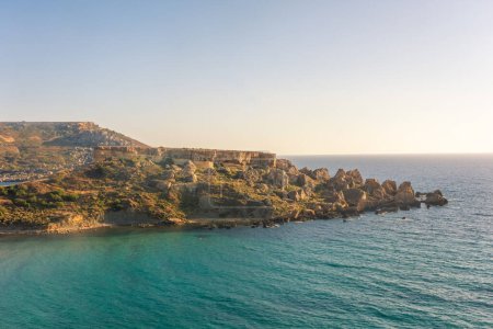 Photo for Ghajn Tuffieha Beach at sunset, in the Golden Bay of Malta - Royalty Free Image