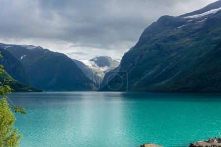 Foto de Landscape of the Lovatnet glacial lake with turquoise crystal clear water, Norway - Imagen libre de derechos