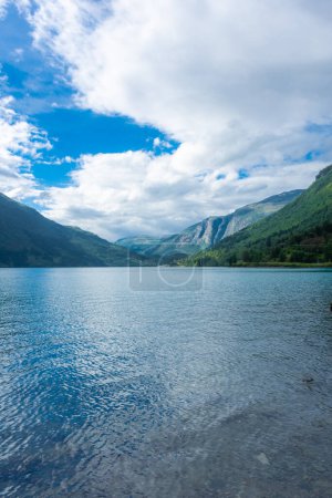 Foto de Landscape of the Lovatnet glacial lake with turquoise crystal clear water, Norway - Imagen libre de derechos