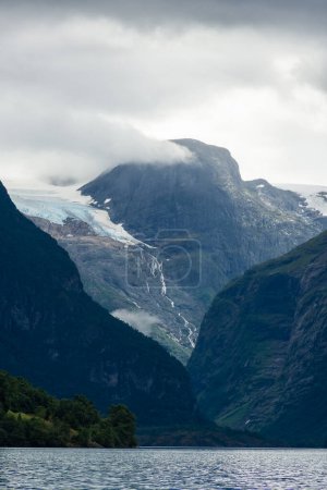 View of the Jostedalen Glacier melting over the Lovatnet Lake, Norway