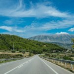 countryside road across the mountains in the countryside of the Albania. roadtrip picture