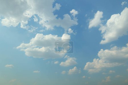 Blue sky white clouds background 