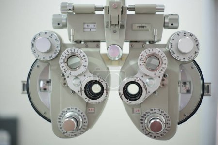Photo for Phoropter eye test in optical store - Royalty Free Image