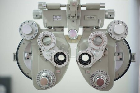 Photo for Phoropter eye test in optical store - Royalty Free Image