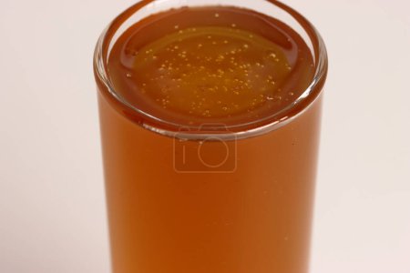 Fresh honey. Glass of natural honeycomb