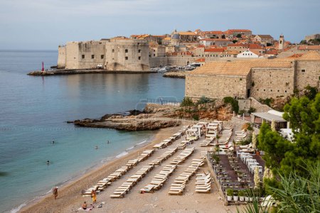 Photo for Dubrovnik, Croatia, Sepember 13th,  2023: Banje beach and view of old town - Royalty Free Image