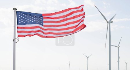 Die amerikanische Flagge flattert auf dem Rücken von Windrädern. Symbol nachhaltiger Entwicklung Vereinigte Staaten von Amerika.