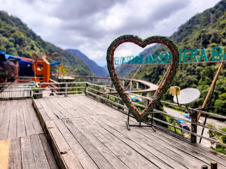 Focus on Love Flower Bouquets as a Spot for taking photos at the Kelok Sembilan Flyover tourist attraction in Payakumbuh, West Sumatra