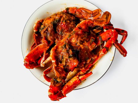 Téléchargez les photos : Crabe à la sauce ou connu sous le nom Kepiting Saus Padang est l'un des aliments traditionnels de l'Indonésie - en image libre de droit