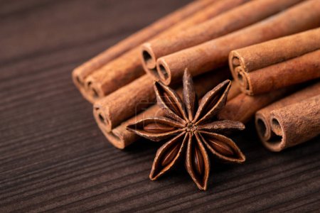 Cinnamon sticks and anice star. Spices for seasoning food on the wooden table