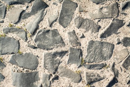 Photo for Ancient road made of cobblestone. Top view - Royalty Free Image