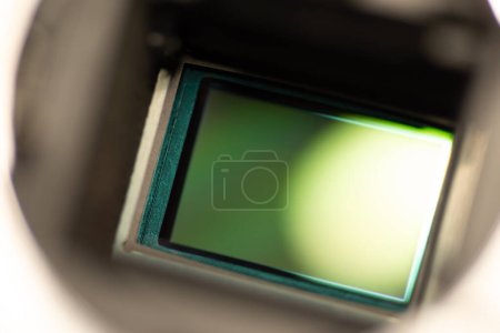 Photo for Close up shot of APC-S camera sensor. Clean sensor of DSLR camera exposed with flipped mirror - Royalty Free Image