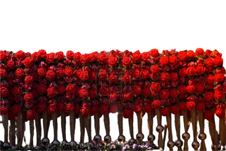 Foto de There are fake textile flowers on the crown. Colorful isolated crowns for sale made of fake flowers - Imagen libre de derechos