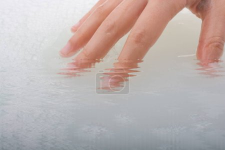 Photo for Hand washing and soap foam on a foamy background - Royalty Free Image