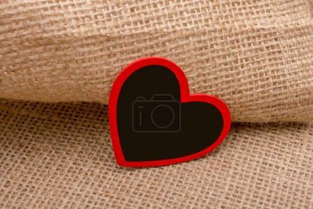 Photo for Heart shaped object placed on canvas - Royalty Free Image