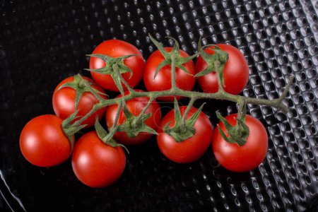 Photo for Bunch of red ripe tasty fresh naturel cherry tomatos - Royalty Free Image