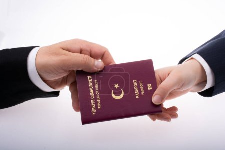 Photo for New Turkish passport. Travel, tourism, emigration and passport control concep - Royalty Free Image