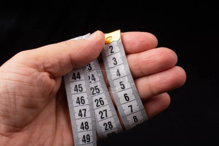 Photo for Soft measuring tape.  tape measure with metric scale - Royalty Free Image