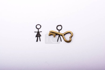 Photo for Stick man, woman and heart shaped key on white background - Royalty Free Image